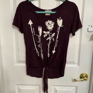 Burgundy blouse with white design